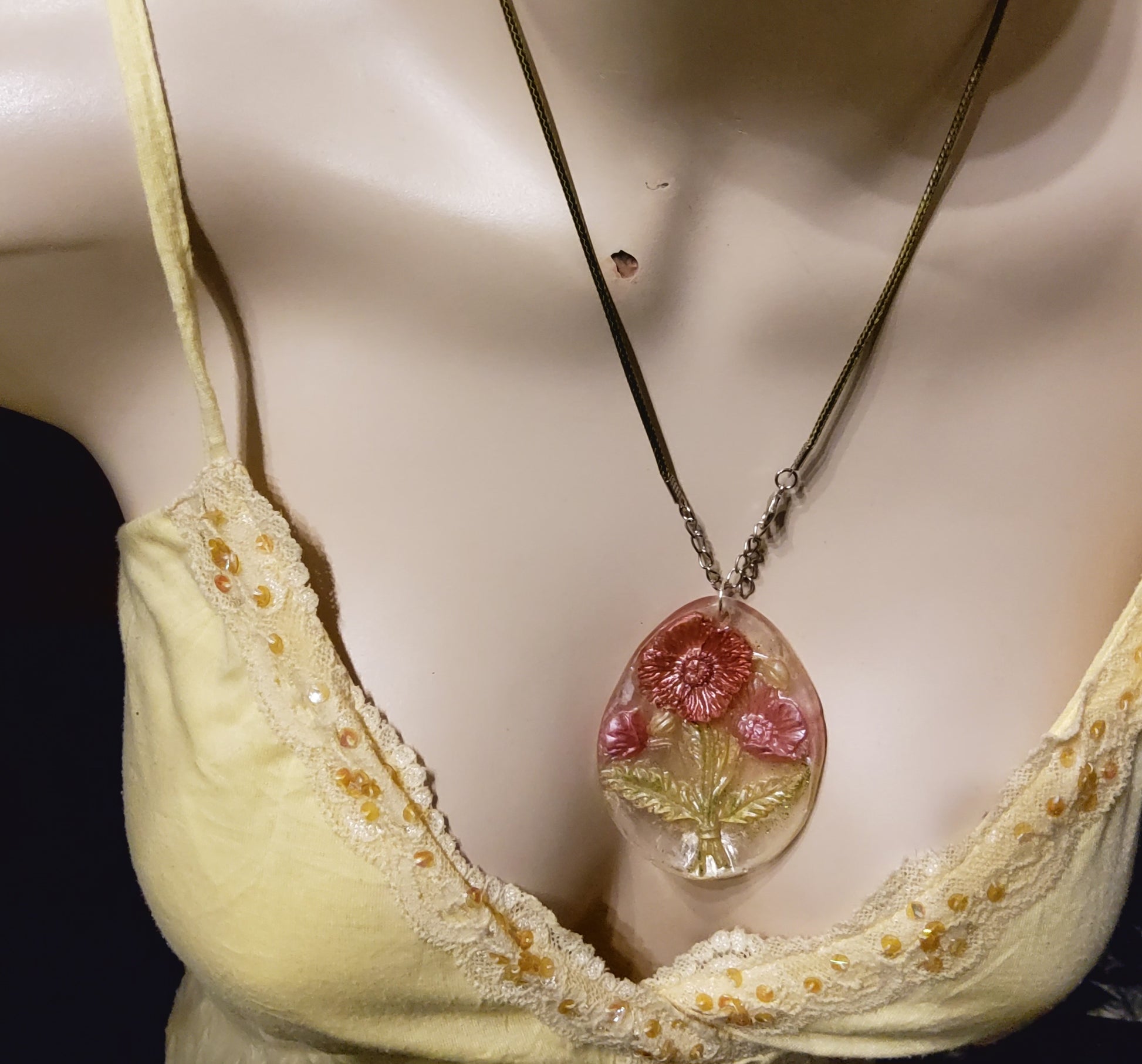 3D resin oval necklace rose gold worn on mannequin front view