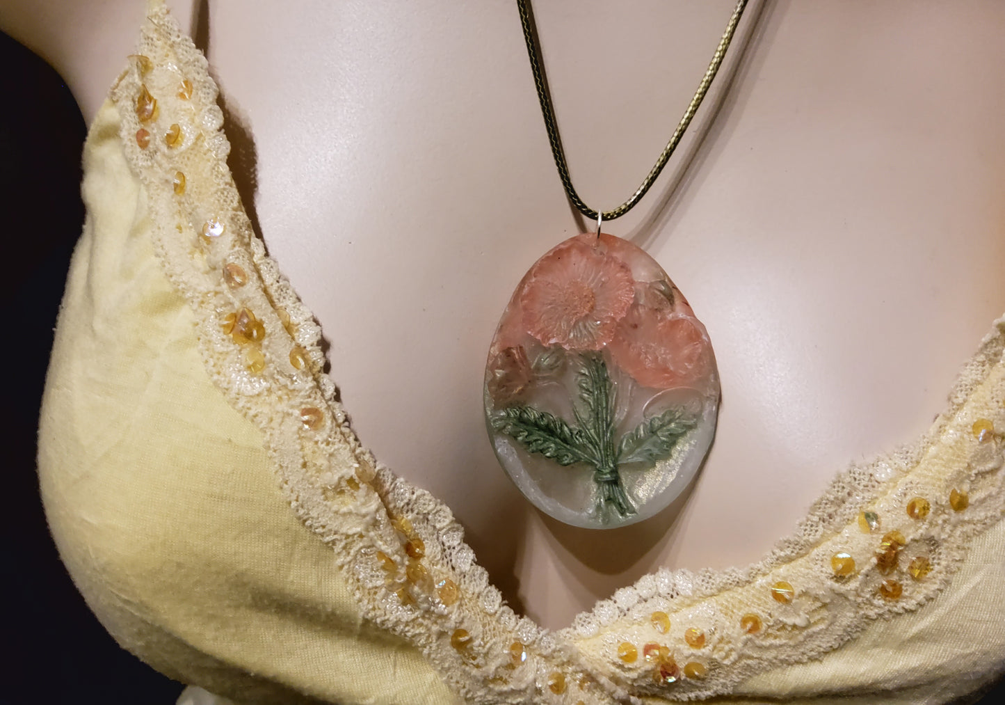3D resin oval necklace peach blossom green on mannequin front view