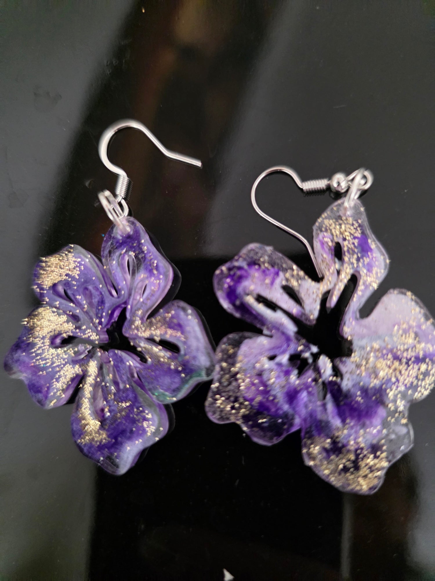 Purple hibiscus resin drop earrings with gold glitter