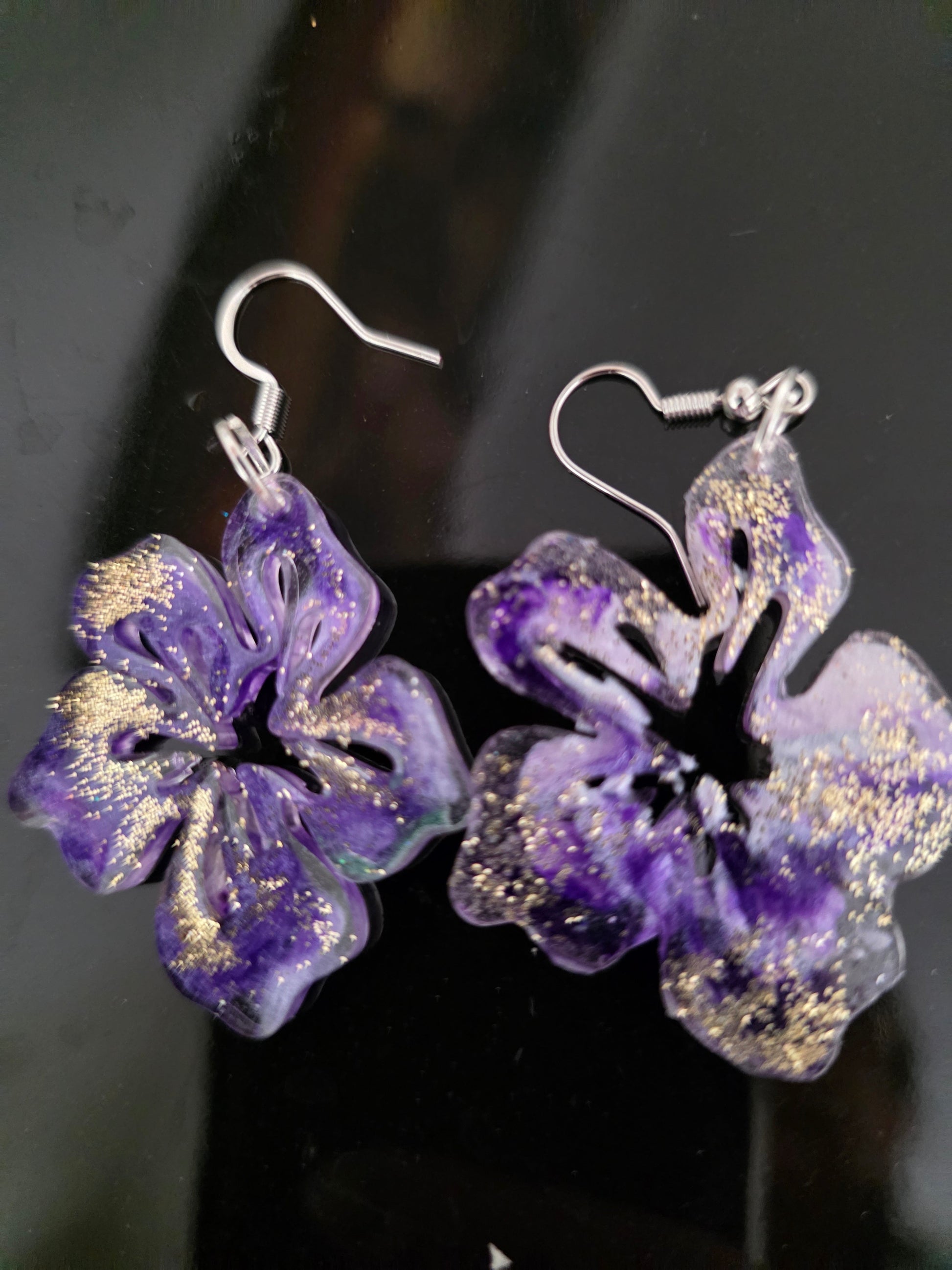 Purple hibiscus resin drop earrings with gold glitter