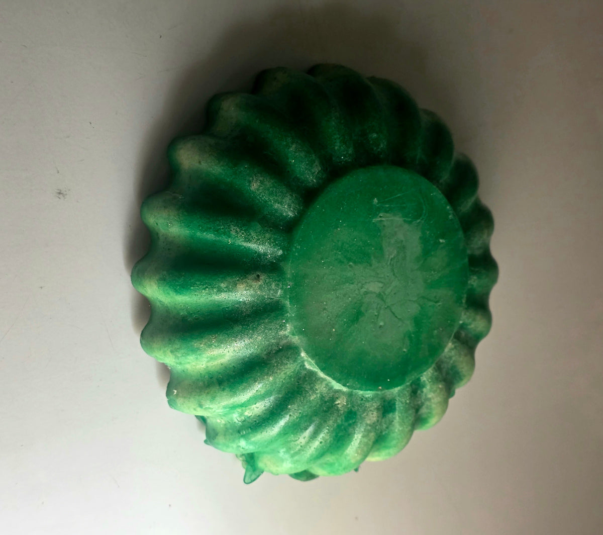 Emerald green resin rose bowl - bottom angle view